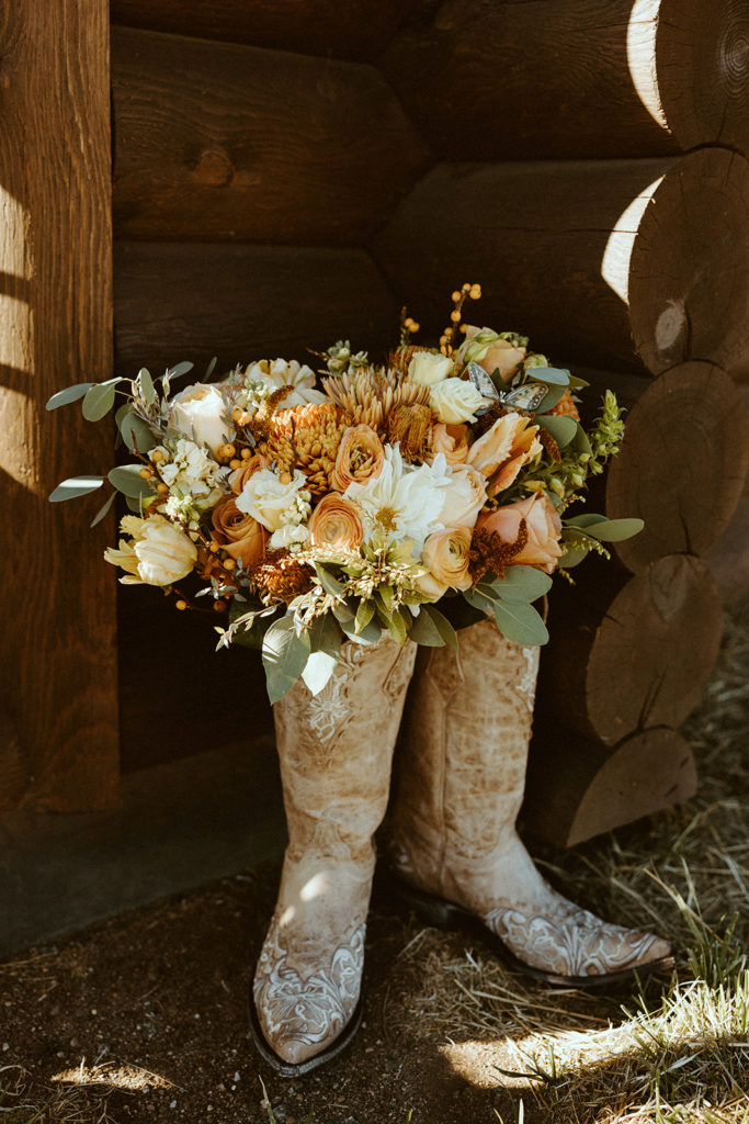 Wedding boots with wedding flowers inside