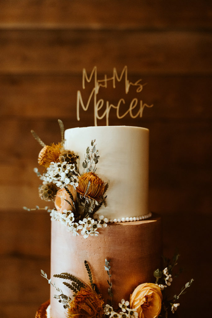 Wedding cake that says mr and mrs mercer for montana paradise valley wedding