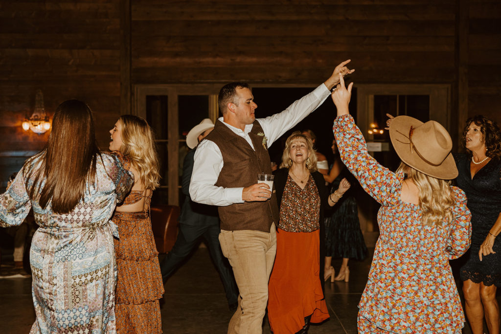 wedding guests dancing at montana wedding reception