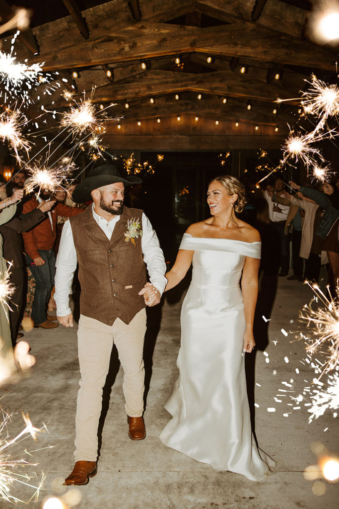 Bride and grooms sparkler exit after montana paradise valley wedding