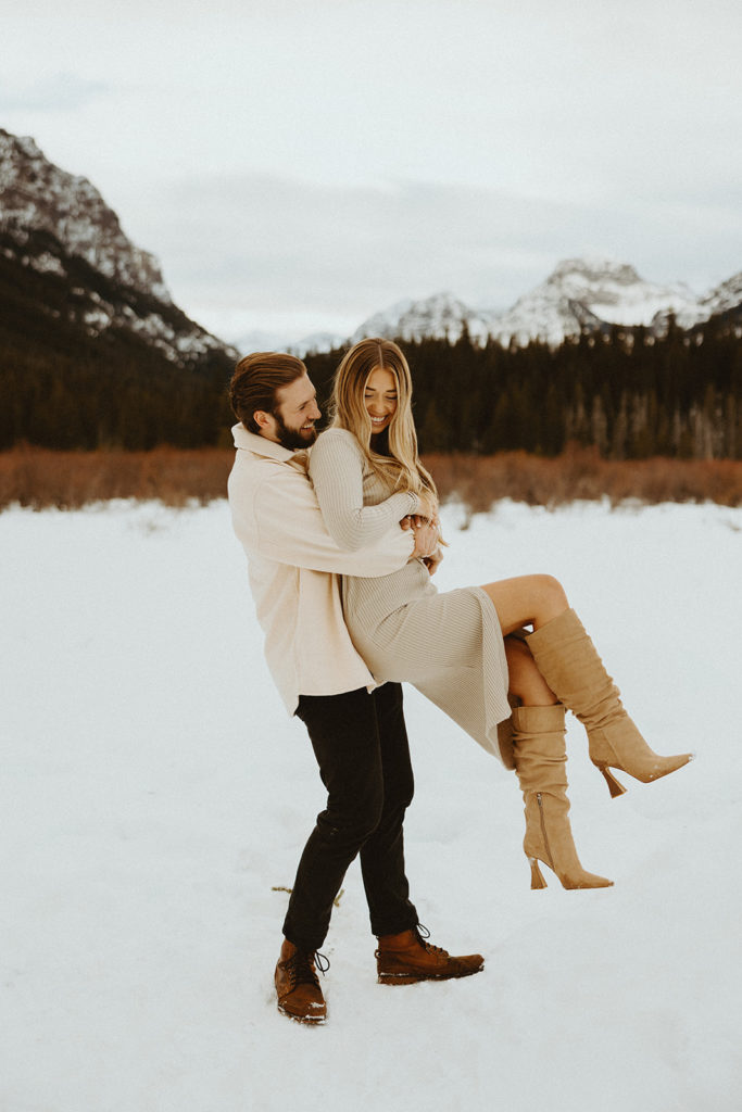 Couple posing for Bozeman Montana winter engagement photos