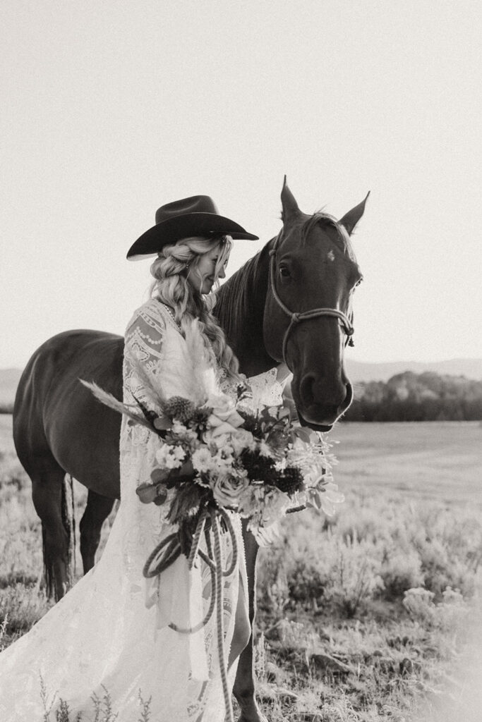 Bride posing with horse