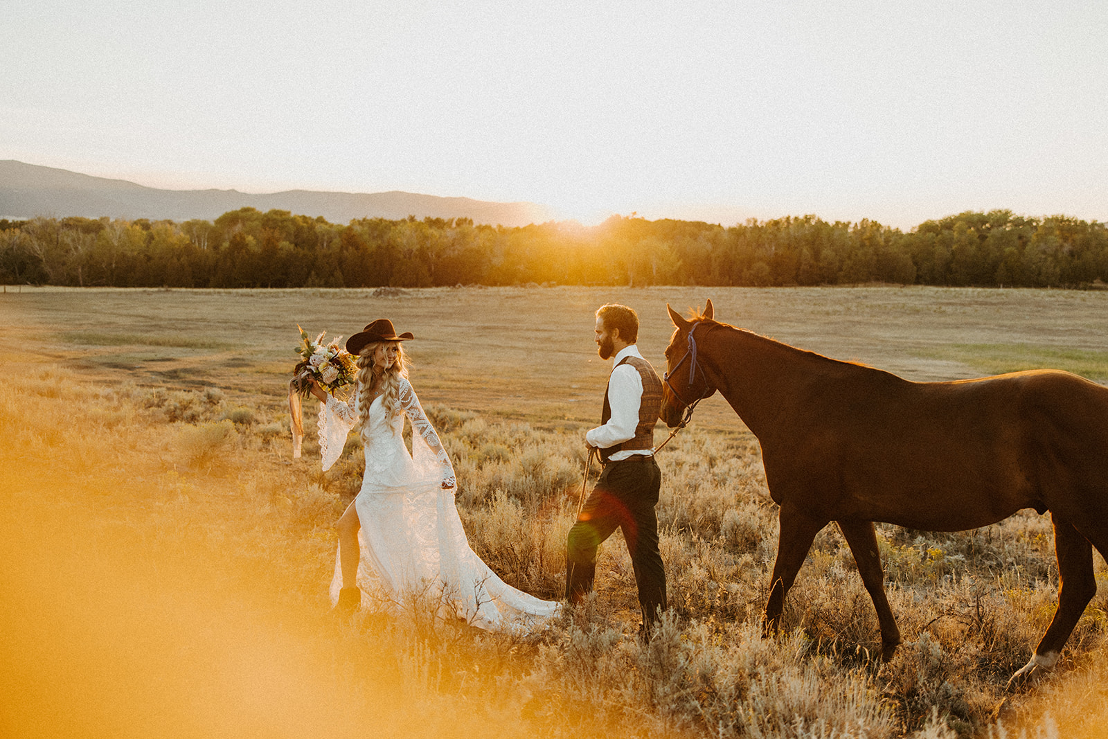 Bride, groom, and horse western wedding portraits captured by Tawnee Bree Photo - Montana Wedding Photographer